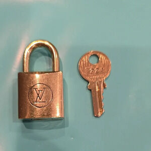 Louis Vuitton Gold Padlock with Key
